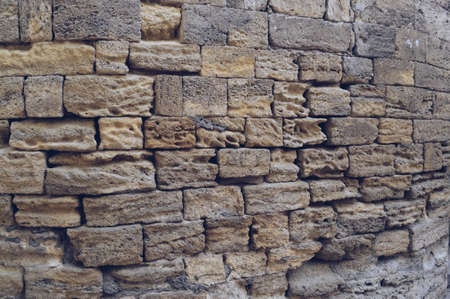 close up view of old weathered brick wall