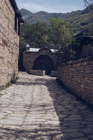street of Lahich - town of Azerbaijan with traditional stone houses located in the mountainsの写真素材