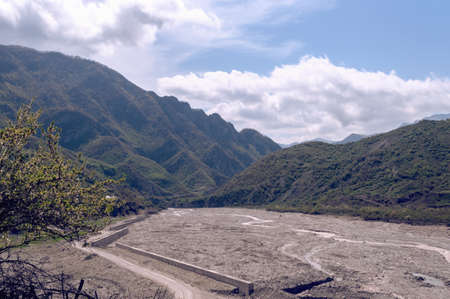 withered river bed in the mountains view from Lahich village of Azerbaijanの写真素材