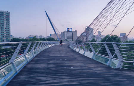 Seoul, South Korea â 13 May 2017 : couple walking at Suetang Bridge at dusk time with cityscape viewのeditorial素材