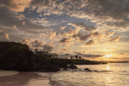Stunning sunset at Hamdeok Beach on Jeju islandの写真素材