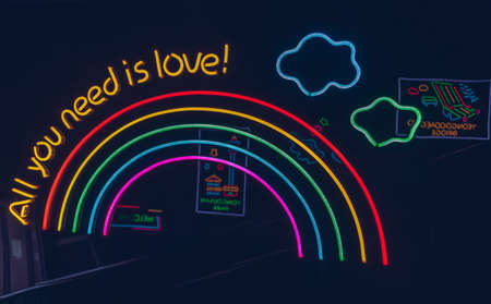 Busan, South Korea, September 14, 2019: neon sign with text 'all you need is love' and rainbow symbol inside tunnel with staircaseのeditorial素材