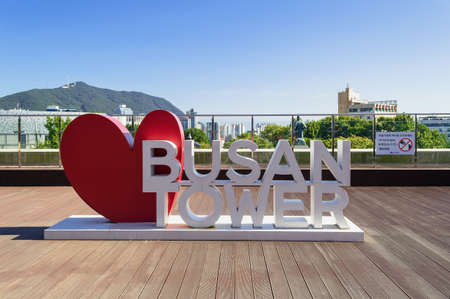 Busan, South Korea, September 14, 2019: Large sign of Busan tower with red heart and cityscape on backgroundのeditorial素材