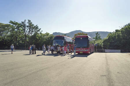 Busan, South Korea, September 14, 2019: tourist buses taking away tourists from Busan tower on sunny dayのeditorial素材