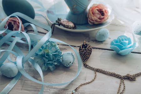 decorative accessories lying on wooden table for packaging or other celebration designの写真素材