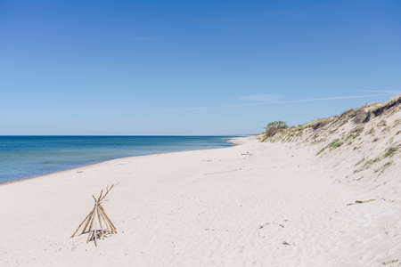 white sand beach view on sunny day at curonian spitの写真素材