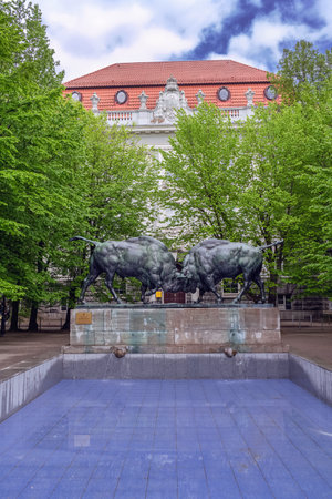 Kaliningrad, Russia - may 16, 2021: Sculpture of  Fighting Bisons made in 1911 and fountain on cloudy spring dayのeditorial素材