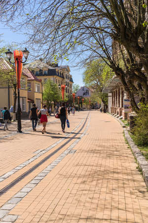 Zelenogradsk, Russia - may 11, 2021: view of shopping and walking street with people on sunny spring dayのeditorial素材