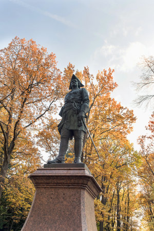 Petergof, Russia - October 2, 2021: Monument to Peter I with autumn foliage on backgroundのeditorial素材