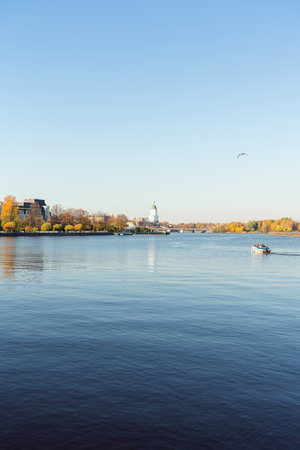motor boat sailing at Wiborgs bay on the bright autumn dayの写真素材