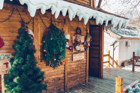 Christmas decoration on wooden house part of cafe exterior in suburban Chinaの写真素材