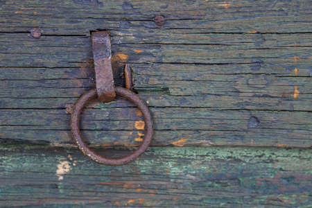 Rusty pull ring on a shed door.の写真素材