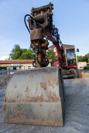 Digger in a roadwork construction site.