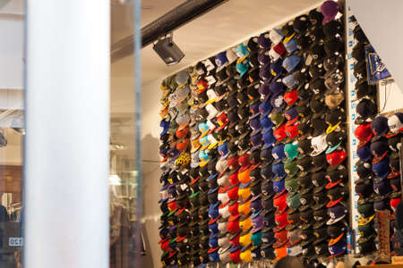Lots of caps on a shop wall nicely arranged.のeditorial素材