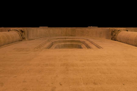 Cathedral wall from below at nightの写真素材