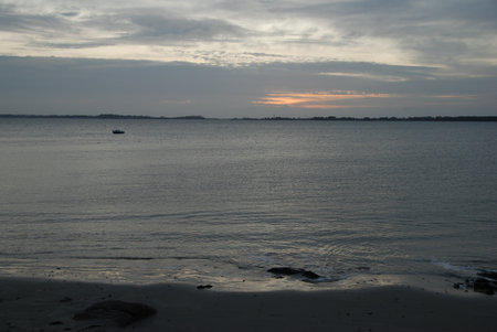 Sunset on the beach of the Baltic Sea in Klaipeda, Lithuaniaの写真素材