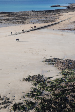 A view of the beach at low tide in the north of Portugalの写真素材