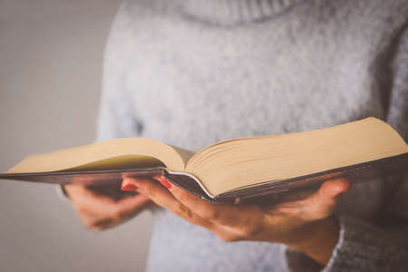 Woman reading a bookの写真素材