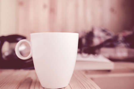 Tea and reading time in a cozy balcony.