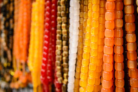 Closeup of colorful beads on the oriental market. Beautiful background blur. Selective focus.の写真素材