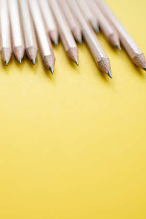 Back to school. Pencils on color paper background with copy space using as...