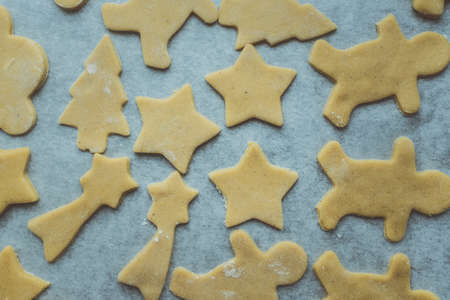 Baking cookies for Christmas. Cookies on baking sheet. Selective focus.