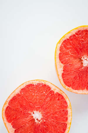 Fresh half grapefruit isolated on white background.の写真素材