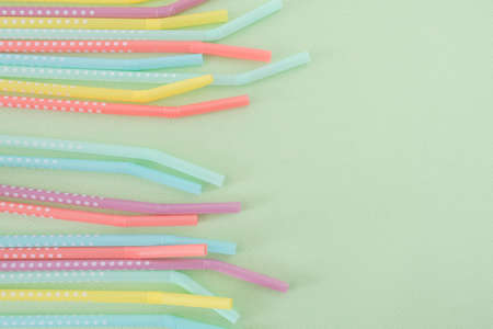 Plastic straws and planet pollution concept. Single use straws are on the war on plastic.の写真素材