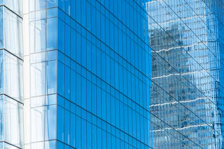 Street view over glass building facade with lines and windows. Graphic pattern architecture, urban...
