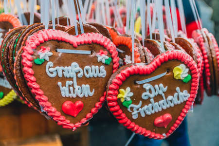 Traditional decorated Christmas gingerbread hearts on the Christmas market in Vienna.の写真素材