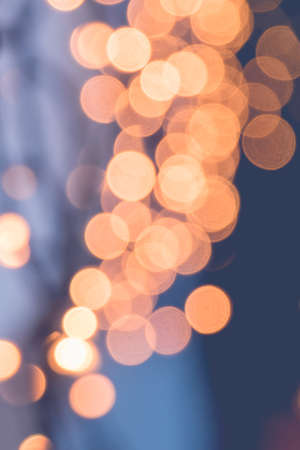 Night city street lights in the christmas time. Bokeh background.の写真素材