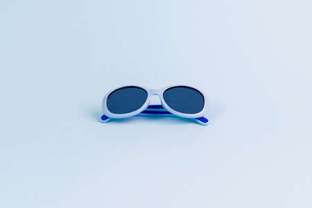 Cute blue childrens sunglasses with UV protection.の写真素材
