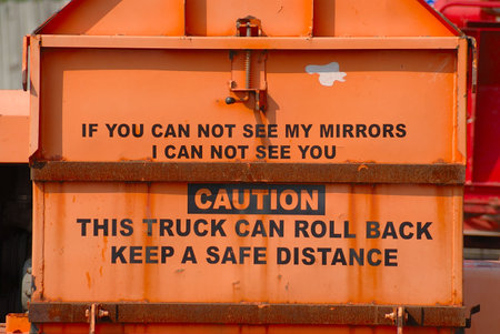 Caution Sign on the back of a work truck.の写真素材