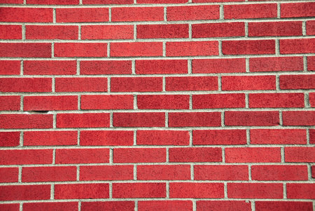 Red Brick Wall with gray mortar.