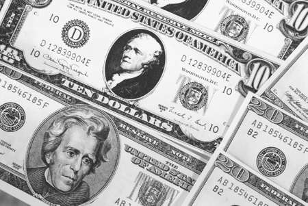 Macro background of banknotes in tens and twenties US currency.