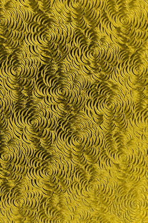 Gold handmade paper with flower petal swirl inclusions.の写真素材