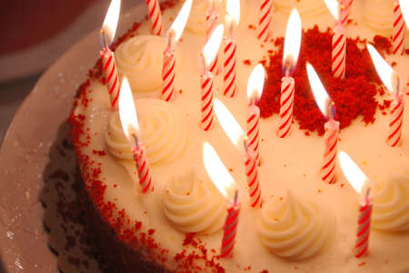 Birthday Cake - Close up of a birthday cake with lighted candles.の写真素材