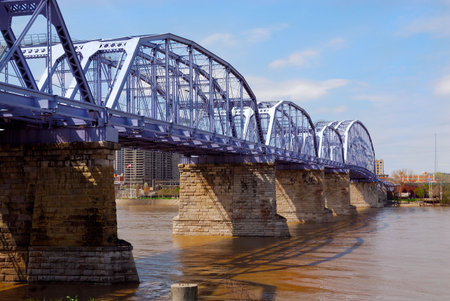 The Newport Southbank Bridge (popularly known as the Purple People Bridge ) stretches 2,670 feet over the Ohio River, connecting Newport, Kentucky to downtown Cincinnati, Ohio. It is the longest pedestrian-only bridge in the United States connecting two sの写真素材