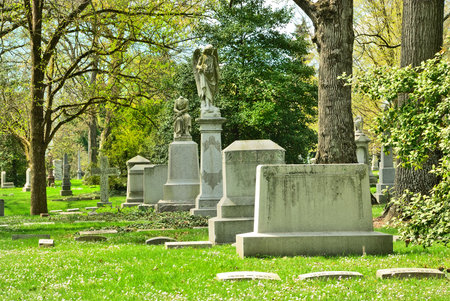 Memorial grave markers at historic Spring Grove Cemetery in Cincinnati Ohio USA.  Spring Grove is the second largest cemetery in the United States and was established in 1845.の写真素材
