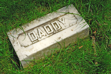 Here Lies Daddy At Rest-Memorial grave marker at historic Spring Grove Cemetery in Cincinnati Ohio USA, the second largest cemetery in the United States, established in 1845.の写真素材
