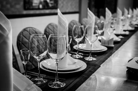 Table setting in restaurant. Black and white photographyの写真素材