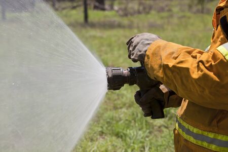 Firefighter with hose