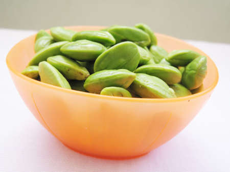 a bowl of petai, one kind of Asian food, nature textureの写真素材