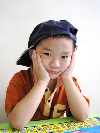 A close up for a asian boy with face expressionの写真素材
