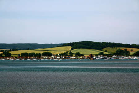 A view over river and opposite bankの写真素材
