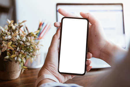 woman using Smartphone. Blank screen mobile phone for graphic display montage.networking service.