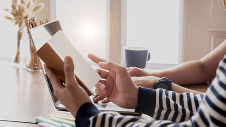 Young students campus or classmates helps friend catching up workbook and learning tutoring in...