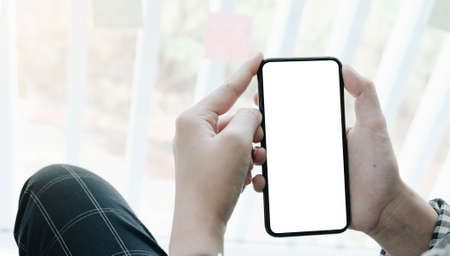 woman using Smartphone. Blank screen mobile phone for graphic display montage.networking service.