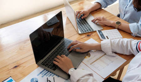 Close up Business people meeting to discuss the situation on the market. Business Financial Concept