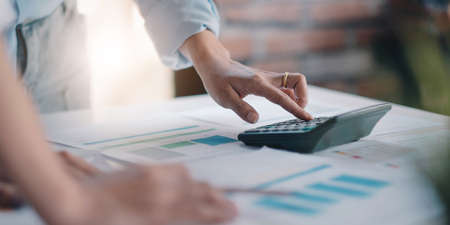 Application for jobs and interviews concept, female is hoping for a resume and recruiter considering application, hr manager making hiring decision.の写真素材